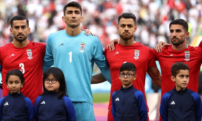 news 9 In support of the anti government protesters at home the Iranian team declines to sing the national anthem prior to their match against England in the FIFA World Cup. with you.